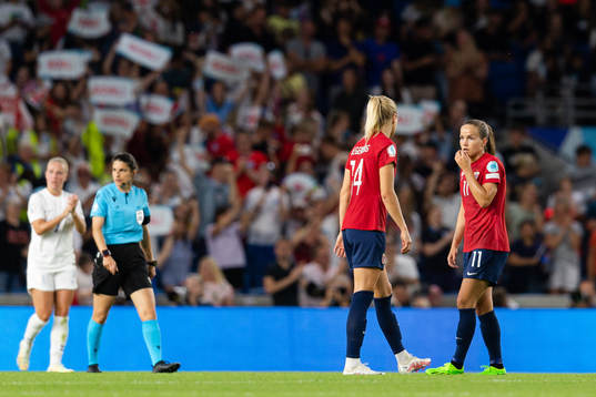 Guro Reiten and Ada Hegerberg of Norway look dejected