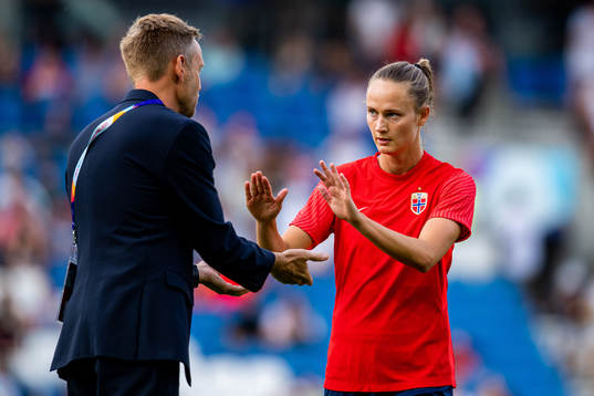 Martin Sjögren, head coach of Norway, and Caroline Graham