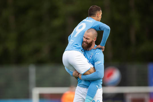 Veljko Birmancevic and Jo Inge Berget of Malmö FF celebrate