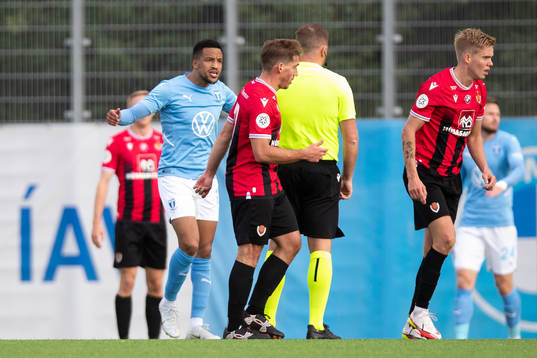 Martin Olsson of Malmö FF reacts to referee John Beaton