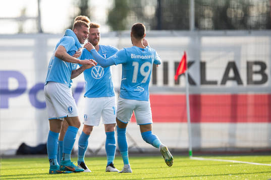 Felix Beijmo of Malmö FF celebrate with teammates