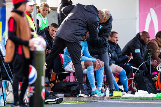 Isaac Kiese Thelin of Malmö FF receives medical assistance