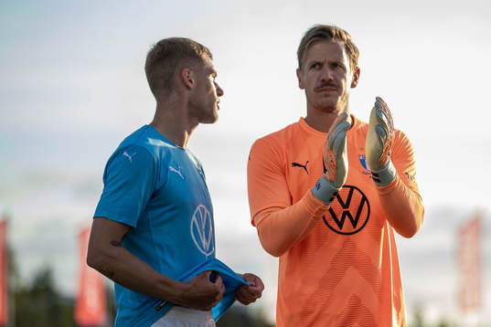 Felix Beijmo and goalkeeper Johan Dahlin of Malmö FF