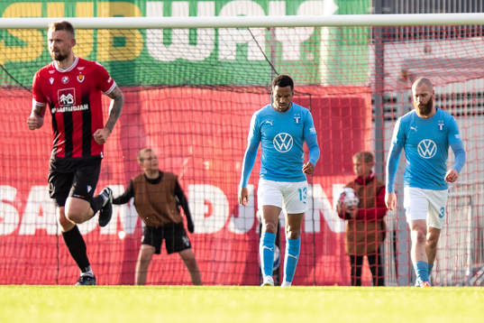 Martin Olsson and Jo Inge Berget of Malmö FF looks dejected