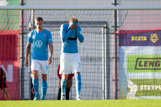 Felix Beijmo and Ola Toivonen of Malmö FF looks dejected