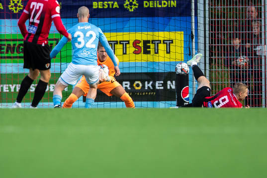 Goalkeeper Johan Dahlin of Malmö FF saves a ball from