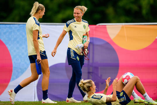 Fridolina Rolfö and goalkeeper Jennifer Falk of the