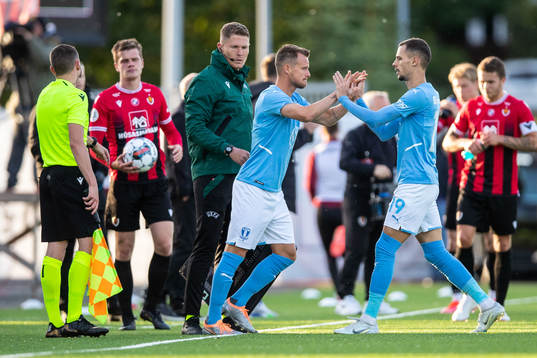 Eric Larsson and Veljko Birmancevic of Malmö FF