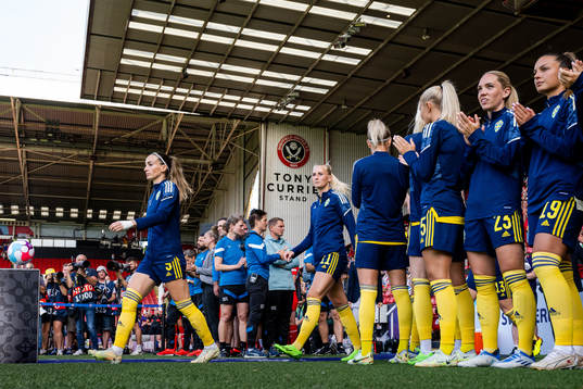 Kosovare Asllani and Stina Blackstenius of Sweden