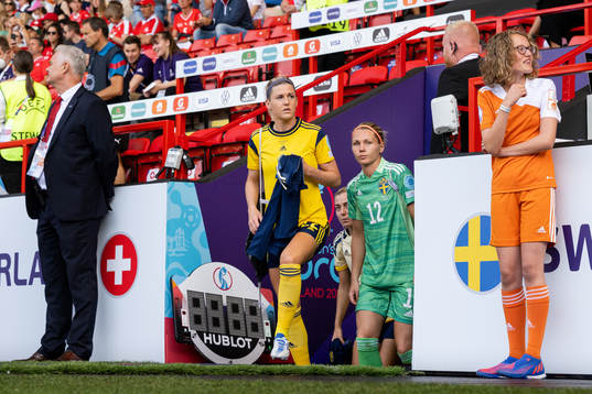 Olivia Schough and goalkeeper Jennifer Falk of Sweden