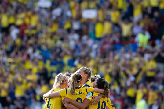 Players of Sweden celebrate with Hanna Bennison