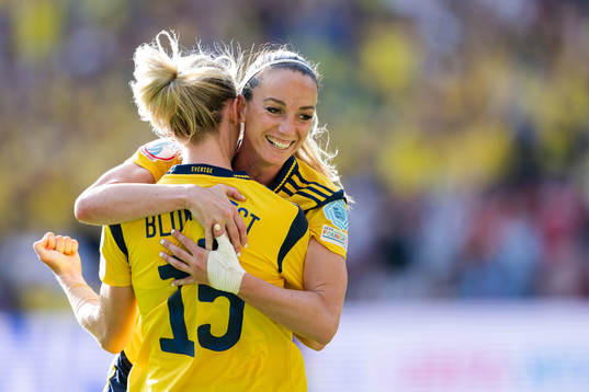 Rebecka Blomqvist and Kosovare Asllani of Sweden celebrate