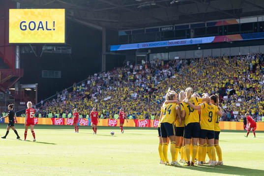 Players of Sweden celebrate a disallowed goal