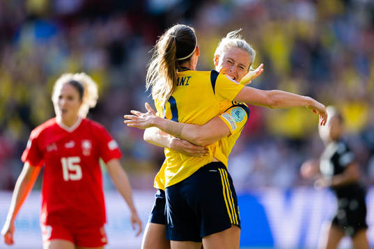 Kosovare Asllani and Rebecka Blomqvist of Sweden celebrate
