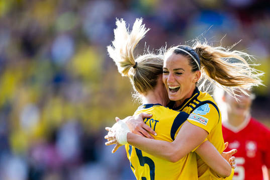 Rebecka Blomqvist and Kosovare Asllani of Sweden celebrate