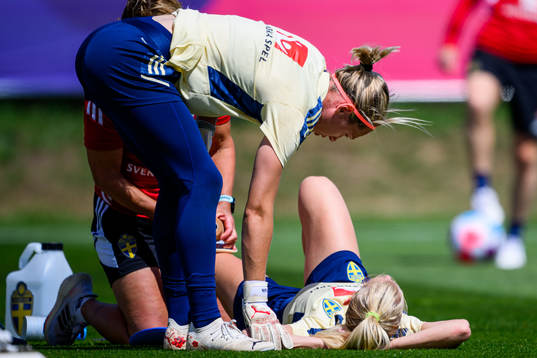 Goalkeeper Jennifer Falk and Sofia Jakobsson of the Swedish