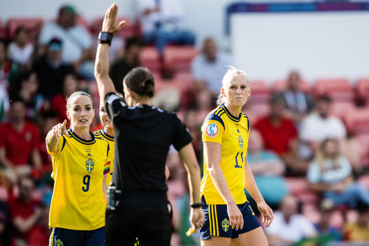 Kosovare Asllani and Stina Blackstenius of Sweden looks