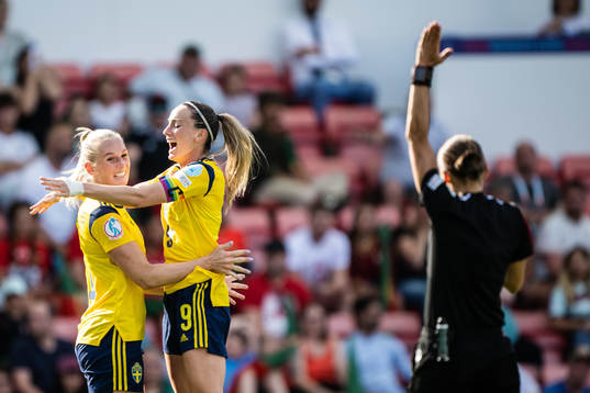 Stina Blackstenius and Kosovare Asllani of Sweden celebrate