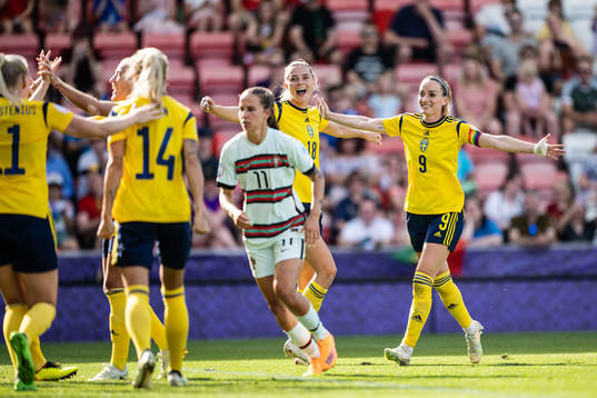 Fridolina Rolfö and Kosovare Asllani of Sweden celebrate