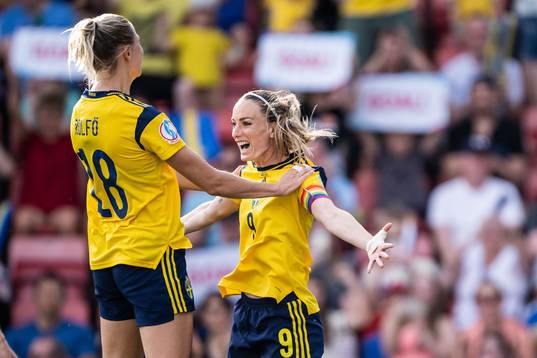 Fridolina Rolfö and Kosovare Asllani of Sweden celebrate