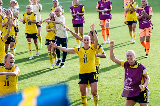 Players of Sweden celebrate