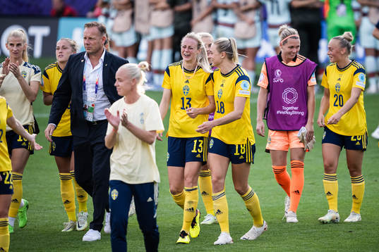Amanda Ilestedt and Fridolina Rolfö of Sweden celebrate