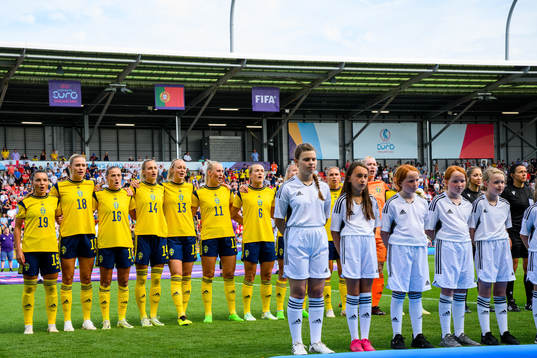 Players of Sweden line up for the national anthem ahead