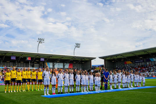 Players of Sweden line up for the national anthem ahead