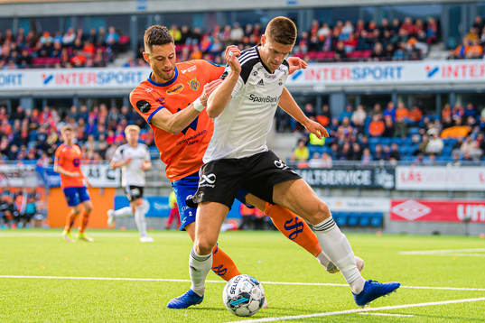 Petar Golubovic of Aalesund and Markus Henriksen of