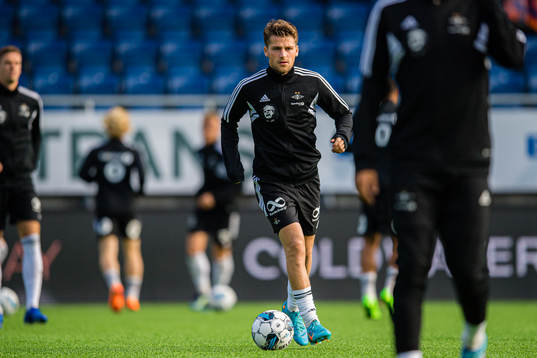 Carl Johan Holse Justesen of Rosenborg warms up