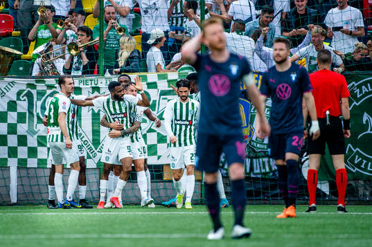 Fabien Ourega and the supporters of FK Zalgiris celebrate
