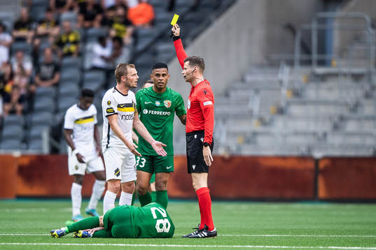 Sebastian Larsson of AIK recieves a yellow card