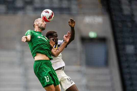Sergiy Yavorskyy of Vorskla Poltava and Erick Otieno Ouma