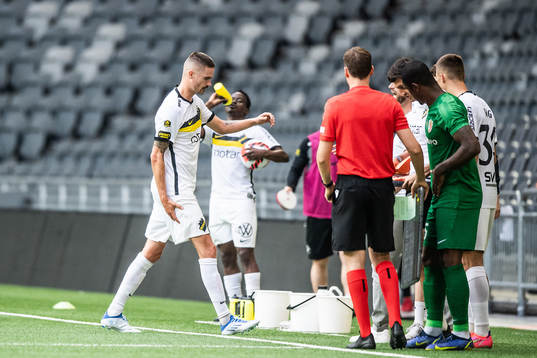 Mikael Lustig of AIK leaves the pitch