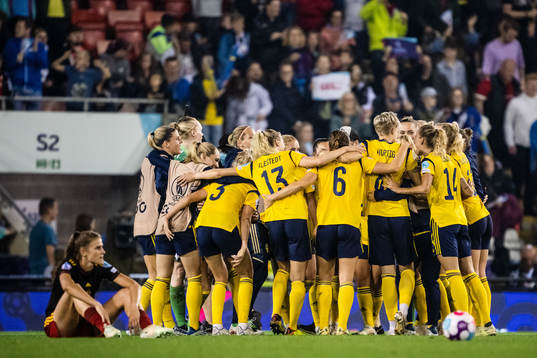 Players of Sweden celebrate