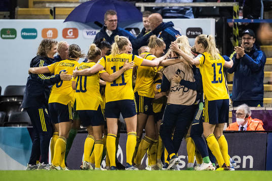 Players of Sweden celebrate