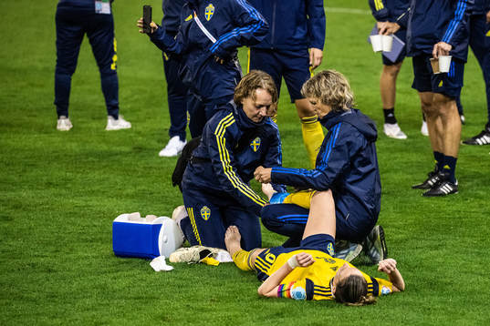 Kosovare Asllani of Sweden receives medical attention
