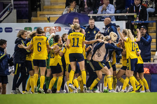 Players of Sweden celebrate