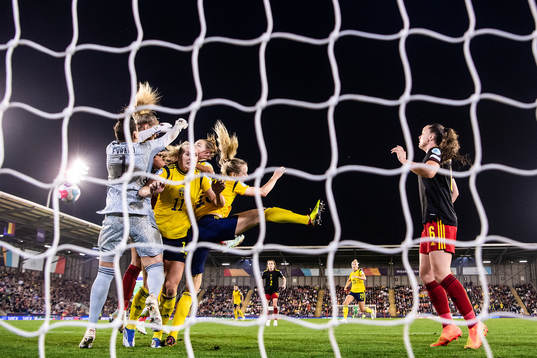 goalkeeper Nicky Evrard of Belgium and Stina Blackstenius