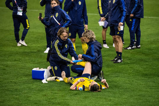 Kosovare Asllani of Sweden receives medical attention