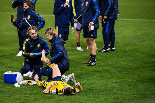 Kosovare Asllani of Sweden receives medical attention
