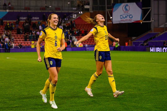 Magdalena Eriksson and Amanda Ilestedt of Sweden celebrate