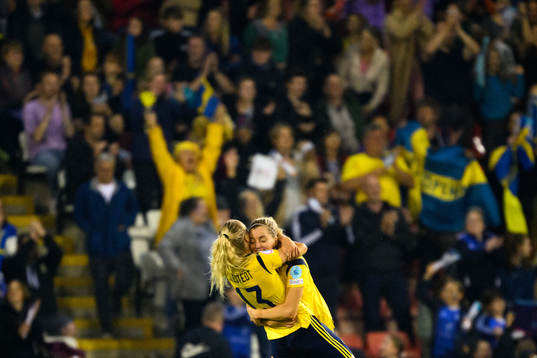 Amanda Ilestedt hugs Linda Sembrant of Sweden