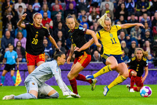 Stina Blackstenius of Sweden fights for the ball with Julie
