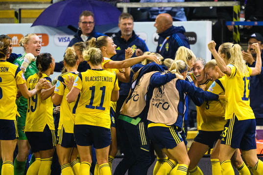 Players of Sweden celebrate