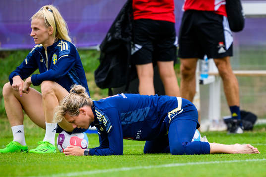 Sofia Jakobsson and goalkeeper Jennifer Falk of the Swedish
