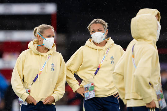 Jonna Andersson and goalkeeper Jennifer Falk of Sweden