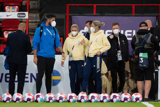 Jonna Andersson and goalkeeper Jennifer Falk of Sweden