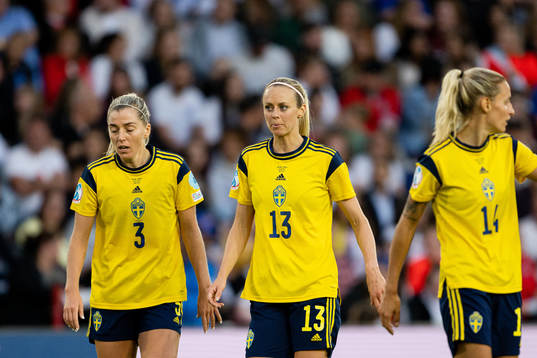Linda Sembrant and Amanda Ilestedt of Sweden look dejected
