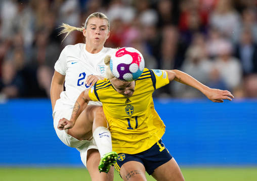 Alessia Russo of England and Caroline Seger of Sweden